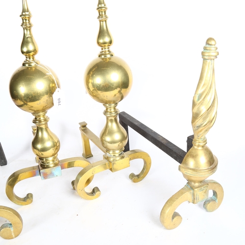 708 - A pair of ornate brass andirons, height 47cm, and a pair of brass and steel andirons