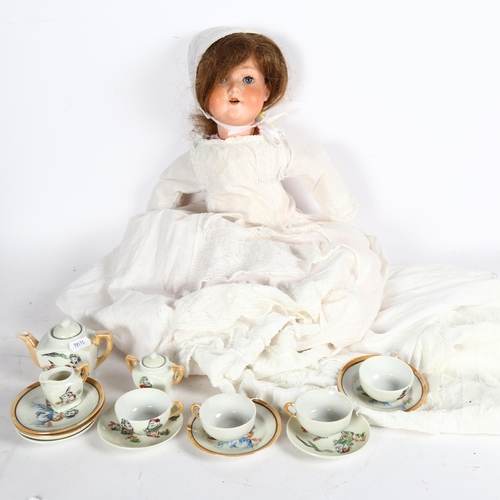 709 - Vintage doll's tea set with Snow White theme, and a German Spezial porcelain-headed doll with jointe... 