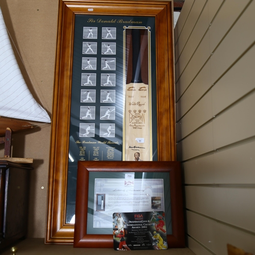 711 - A limited edition Sir Donald Bradman cricket bat, signed with hand painted portrait by Dave Thomas, ... 