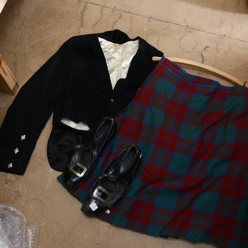 722 - A Scottish tartan kilt, jacket, waistcoat and shoes