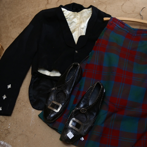 722 - A Scottish tartan kilt, jacket, waistcoat and shoes