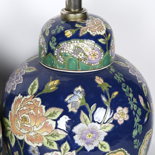 732 - A pair of Oriental ceramic table lamps with enamelled decoration, height overall 45cm