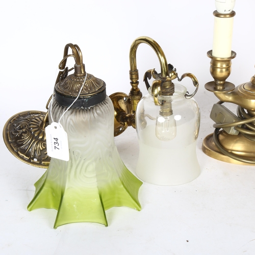 734 - A pair of Art Deco style wall light fittings, and a table lamp with leadlight shade