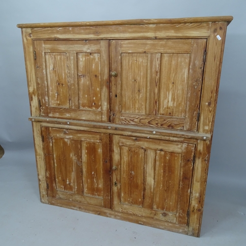 2103 - An Antique pine 4-door cabinet with shelf-fitted interior, 128cm x 135cm x 45cm