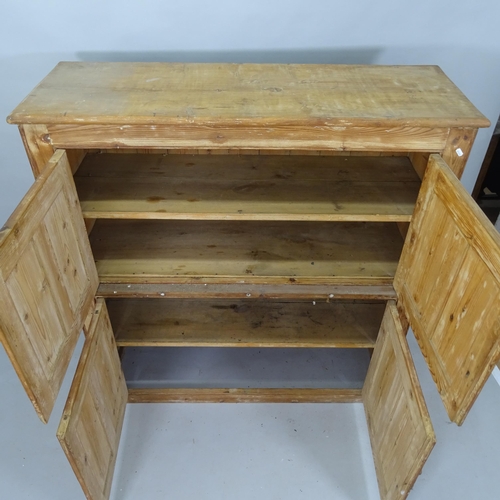 2103 - An Antique pine 4-door cabinet with shelf-fitted interior, 128cm x 135cm x 45cm