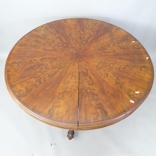 2109 - A 19th century rosewood circular tilt-top dining table, on tripod base, 126cm x 75cm