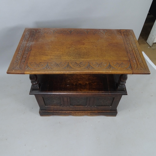 2120 - A 1920's oak carved and panelled monk's bench, with lifting seat, 91cm x 95cm x 42cm