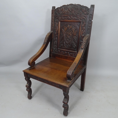 2129 - An Antique oak Charles II style chair, with carved decoration, overall 60cm x 115cm x 58cm