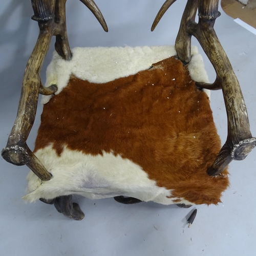 2130 - A modern resin antler chair, overall 64cm x 120cm x 60cm