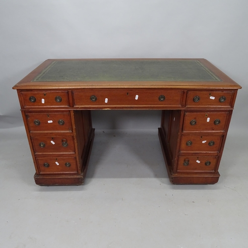 2146 - A Victorian mahogany pedestal writing desk, with tooled and embossed leather skiver and 9 fitted dra... 