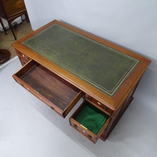 2146 - A Victorian mahogany pedestal writing desk, with tooled and embossed leather skiver and 9 fitted dra... 