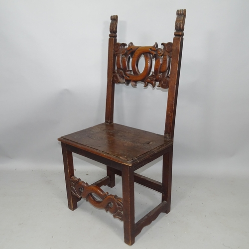 2150 - A pair of 19th century Renaissance Revival oak hall chairs, with auricular carved back and stretcher