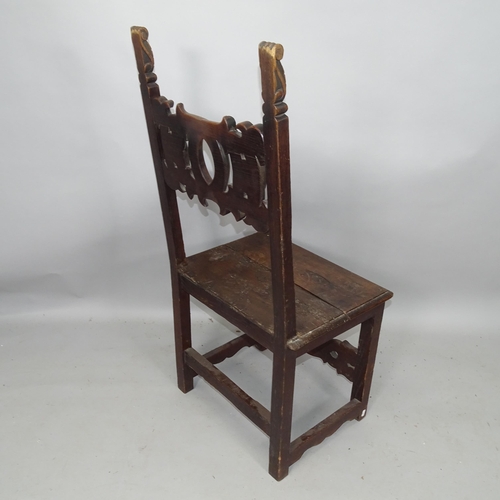 2150 - A pair of 19th century Renaissance Revival oak hall chairs, with auricular carved back and stretcher