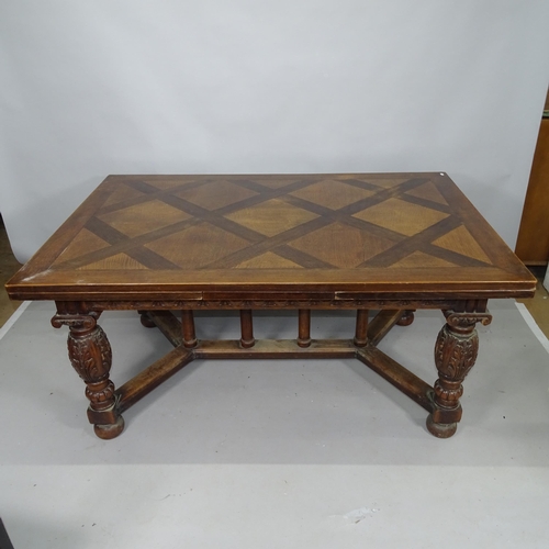 2154 - An oak parquetry top draw leaf dining table, with carved baluster legs and cross stretcher, 160cm (e... 