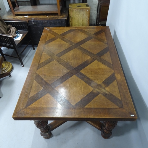 2154 - An oak parquetry top draw leaf dining table, with carved baluster legs and cross stretcher, 160cm (e... 