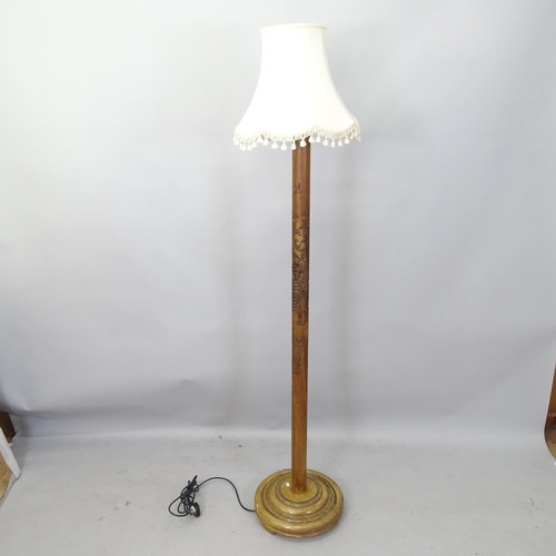 2169 - An Oriental hardwood standard lamp, with carved decoration, height to bayonet 168cm