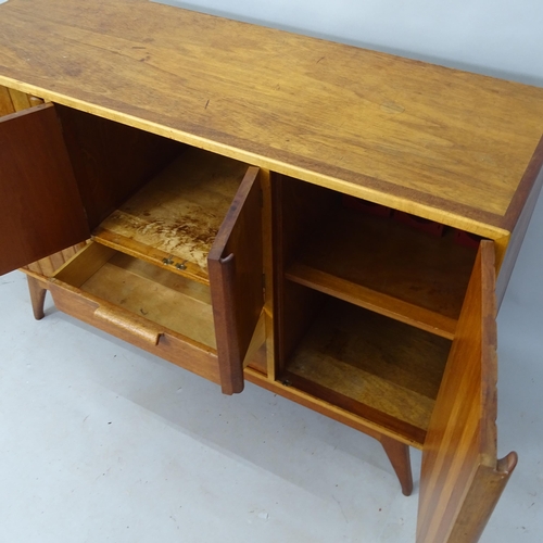 2171 - A mid-century teak sideboard, in the manner of Heals, having 4 cupboard doors and 2 drawers under, 1... 