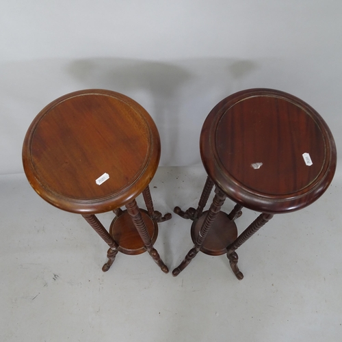 2172 - A matched pair of mahogany torchers, tallest 100cm