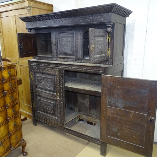 2174 - An Antique oak 2-section court cupboard, with chip carved decoration, on stile legs, 145cm x 186cm x... 