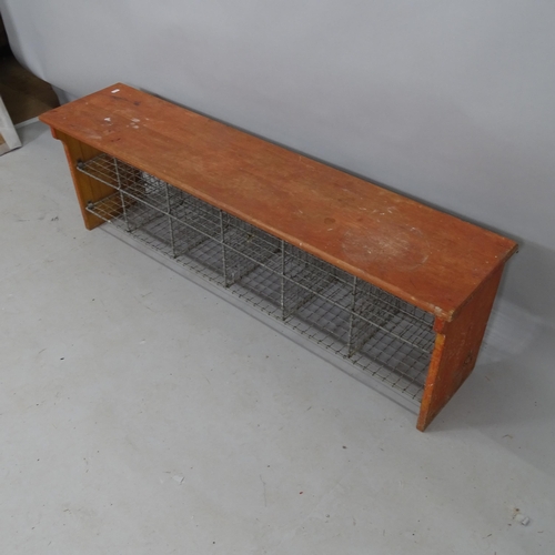 2176 - A teak and mesh bank of 12 pigeon holes, 137cm x 43cm x 31cm