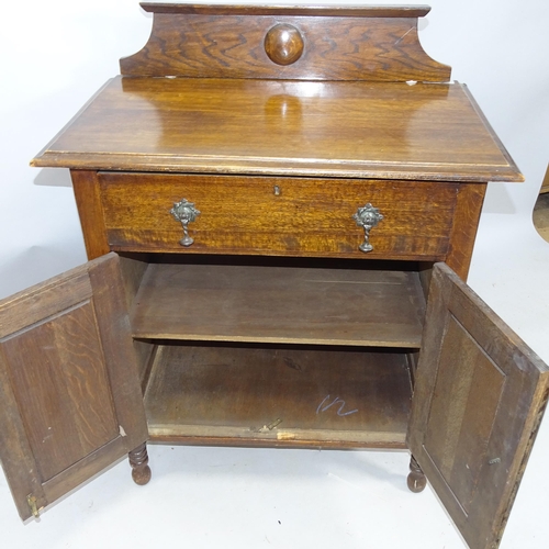 2180 - A oak hall cabinet, with raised back, single fitted drawer and cupboards under, 77cm x 96cm x 46cm