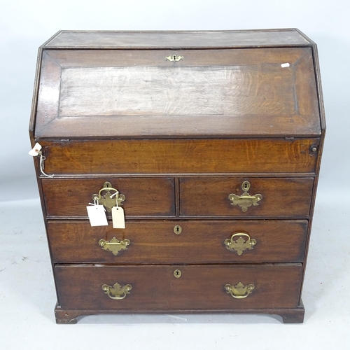 2182 - A Georgian oak bureau, with well fitted interior, and 2 short and 2 long drawers, on bracket feet, 9... 