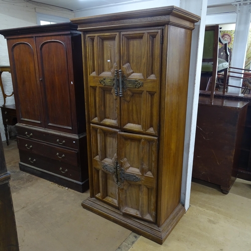 2188 - A Spanish oak 4-door armoire, the interior fitted with 4 drawers and shelved compartments, 99cm x 19... 