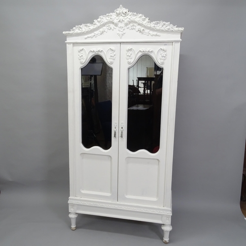 2000 - A French painted 2-door armoire with 2 glazed panelled doors and carved decoration, 93cm x 193cm x 4... 