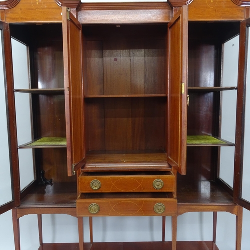 2001 - A 19th century mahogany inverted break-front cabinet on stand in 2 sections, 141cm x 195cm x 43cm