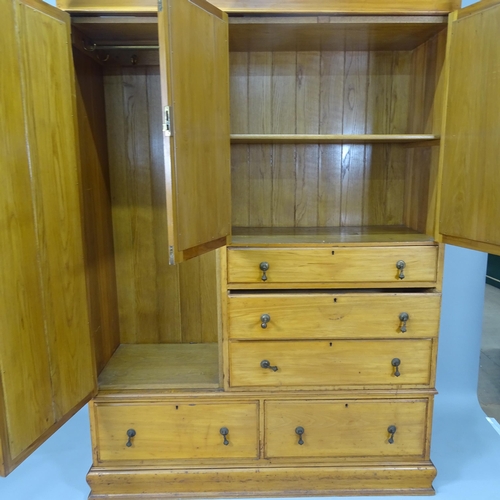 2004 - An Edwardian ash Beaconsfield  wardrobe in 4 sections, comprising a mirrored cupboard section adjace... 