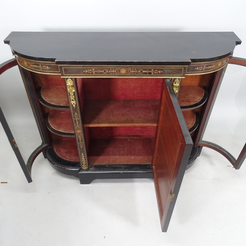 2014 - A Victorian ebonised credenza, with bow-end glazed doors and central panelled door, satinwood bandin... 