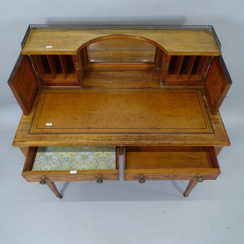 2021 - A late Victorian mahogany and satinwood-strung lady's writing desk, with raised mirrored back, 92cm ... 