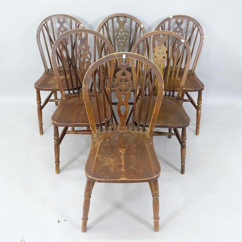 2022 - A set of 6 wheel-back dining chairs