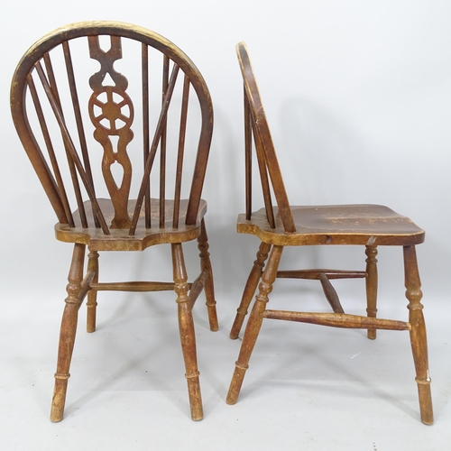 2022 - A set of 6 wheel-back dining chairs