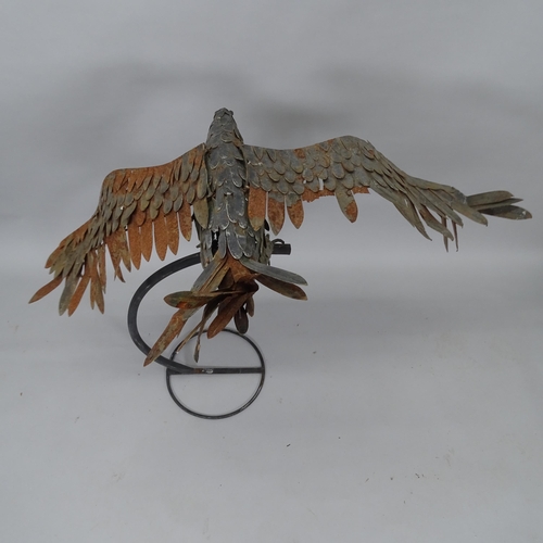 2023 - A painted metal sculpture, study of an eagle on perch, H100cm