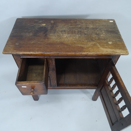 2032 - A oak cabinet, with 2 fitted drawers and single-panel door, on stile legs, 77cm x 76cm x 37cm