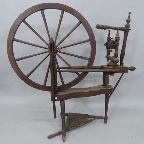 2037 - An Antique spinning wheel