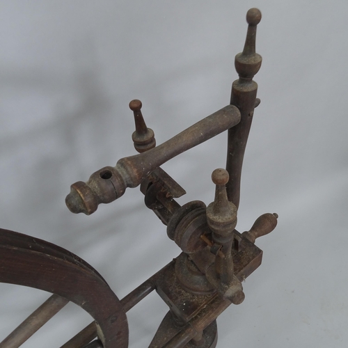 2037 - An Antique spinning wheel