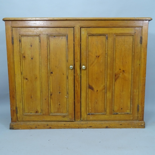 2046 - A Vintage stained pine hall cabinet, with 2 panelled doors, 137cm x 107cm x 39cm