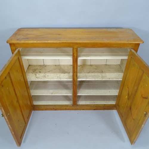 2046 - A Vintage stained pine hall cabinet, with 2 panelled doors, 137cm x 107cm x 39cm