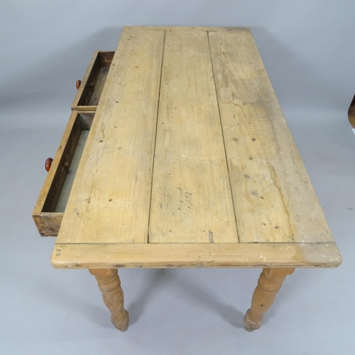 2050 - An Antique pine plank-top farmhouse kitchen table, with 2 fitted drawers, 141cm x 75cm x 68cm