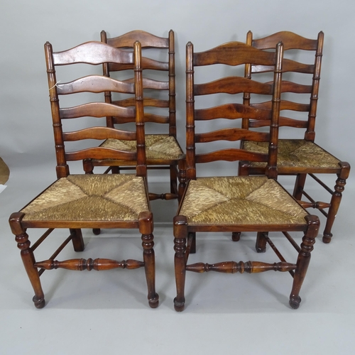 2051 - A set of 4 reproduction rush-seated ladder-back dining chairs. H - 103cm, Seat H - 48cm, W - 54cm to... 