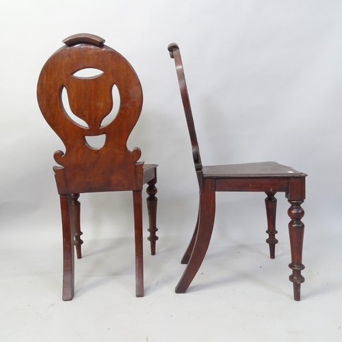 2057 - A pair of Victorian mahogany shield-back hall chairs