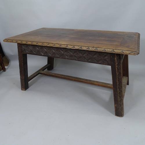 2077 - An Antique carved oak dining table, with H-shaped stretcher, 150cm x 75cm x 84cm