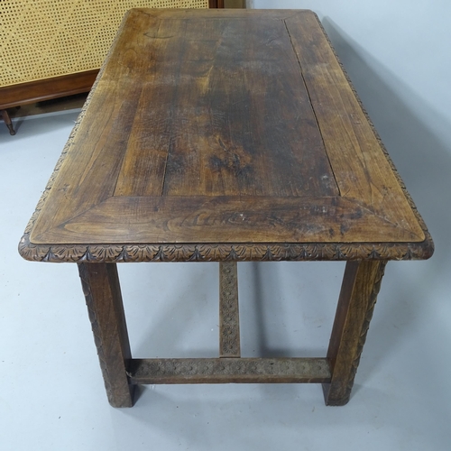 2077 - An Antique carved oak dining table, with H-shaped stretcher, 150cm x 75cm x 84cm