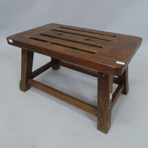 2082 - A stained joined oak footstool, 55cm x 32cm x 35cm