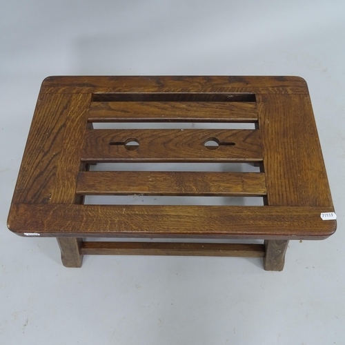 2082 - A stained joined oak footstool, 55cm x 32cm x 35cm