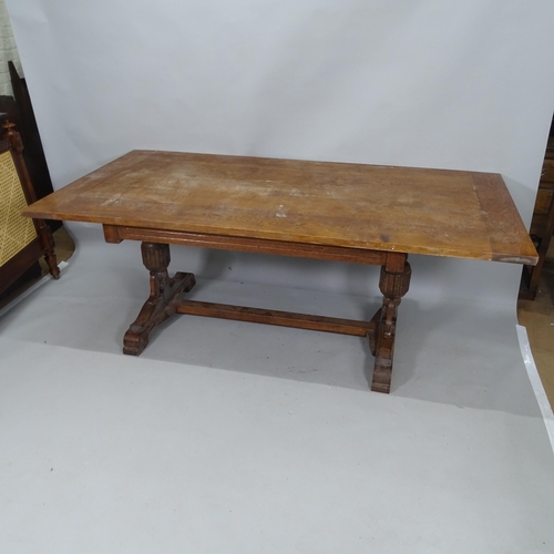 2093 - An Antique oak plank-top refectory dining table, with baluster turned legs and H-shaped stretcher, 1... 