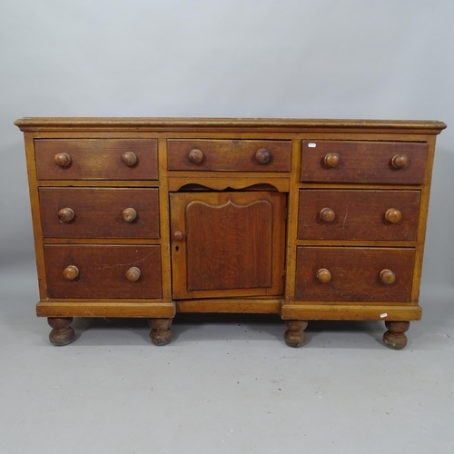 2098 - An Antique mahogany sideboard, having 7 fitted drawers, single cupboard under, on turned legs, 153cm... 