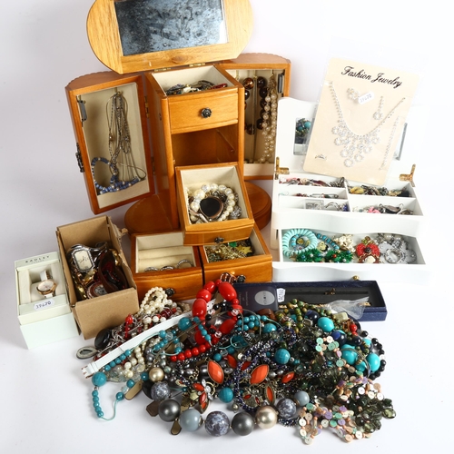 1039 - A large quantity of costume jewellery, including a 2 jewellery boxes, wristwatches etc (boxful)